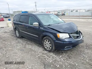 2011 Chrysler Town & Country Touring-L with VIN 2A4RR8DGXBR733551, listed as a IAAI auction lot 41995779 with 235,717 mi miles. Bid and sale history available at carsss.com. Image 1.