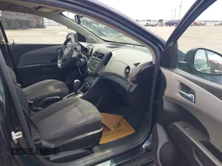2013 Chevrolet Sonic LT with VIN 1G1JC5SH7D4234042, listed as a IAAI auction lot 42179089 with 132,758 mi miles and . Bid and sale history available at DreamBid. Image 5.