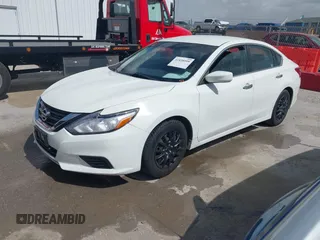 2016 Nissan Altima SR with VIN 1N4AL3AP0GC223999, listed as a IAAI auction lot 41838999 with 159,918 mi miles and . Bid and sale history available at carsss.com. Image 2.
