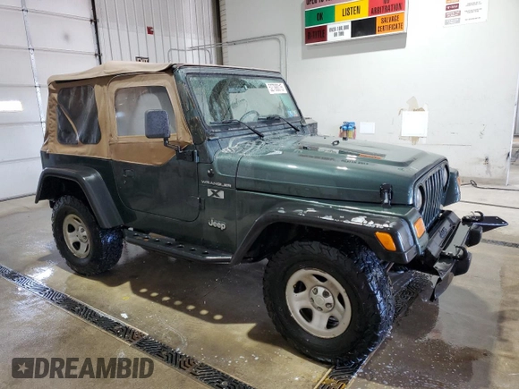 2002 Jeep Wrangler X with VIN 1J4FA39SX2P718415, listed as a Copart auction lot 52788015 with 152,093 mi miles and Salvage Title. Bid and sale history available at carsss.com. Image 4.