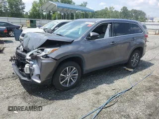 2019 Toyota Highlander SE with VIN 5TDKZRFH1KS336322, listed as a Copart auction lot 59538175 with 77,164 mi miles and Salvage title. Bid and sale history available at DreamBid. Image 1.
