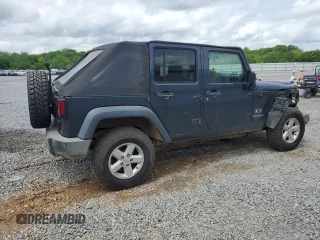 2007 Jeep Wrangler Unlimited X with VIN 1J4GA39117L119395, listed as a Copart auction lot 52588055 with 160,335 mi miles and Salvage title. Bid and sale history available at DreamBid. Image 3.