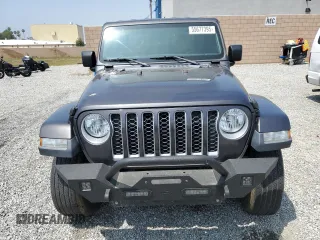 2020 Jeep Gladiator Overland с VIN 1C6HJTFG4LL171074, выставлен на аукционе Copart как лот 55677395 с пробегом 60 506 миль миль и Списание • Salvage title. История ставок и продаж доступна на DreamBid. Изображение 5.