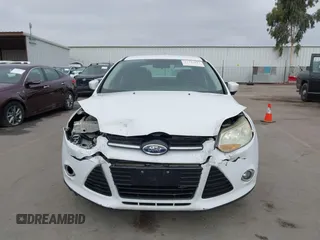 2012 Ford Focus SE with VIN 1FAHP3F22CL227773, listed as a IAAI auction lot 42749922 with 229,944 mi miles and . Bid and sale history available at DreamBid. Image 6.