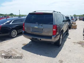 2011 Chevrolet Tahoe LS with VIN 1GNSCAE00BR343816, listed as a IAAI auction lot 42363718 with 253,212 mi miles and . Bid and sale history available at DreamBid. Image 4.