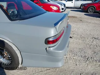 1992 Nissan 240SX z VIN JN1MS34P9NW100593, wystawiony jako IAAI lot #40867667 z przebiegiem Nie podano mil oraz . Historia ofert i sprzedaży dostępna na DreamBid. Obrazek 11.