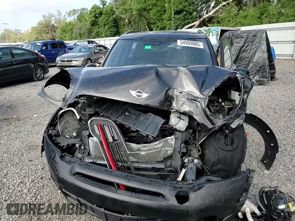 2015 MINI Countryman S with VIN WMWZC3C57FWP52868, listed as a Copart auction lot 54909085 with 68,003 mi miles and Salvage title. Bid and sale history available at DreamBid. Image 14.