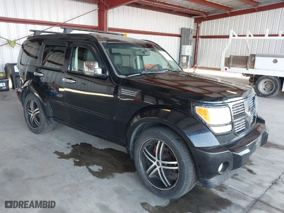 2007 Dodge Nitro R/T with VIN 1D8GU58637W630452, listed as a IAAI auction lot 40384758 with 160,498 mi miles. Bid and sale history available at carsss.com. Image 1.