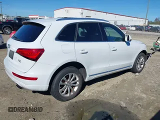 2014 Audi Q5 Premium z VIN WA1CFAFP0EA061818, wystawiony jako IAAI lot #40845361 z przebiegiem 166 333 mil mil oraz . Historia ofert i sprzedaży dostępna na DreamBid. Obrazek 4.