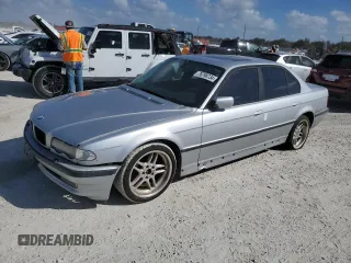 2000 BMW 7 Series 740iA with VIN WBAGG8349YDN79868, listed as a Copart auction lot 76798734 with 0 mi miles and Salvage Title. Bid and sale history available at carsss.com. Image 1.
