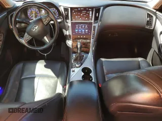 2015 Infiniti Q50 Premium z VIN JN1BV7ARXFM391291, wystawiony jako Copart lot #61765885 z przebiegiem 129 617 mil mil oraz Szkoda całkowita • Salvage title. Historia ofert i sprzedaży dostępna na DreamBid. Obrazek 8.