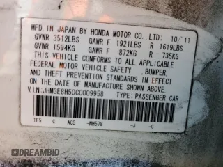 2012 Honda Fit Sport with VIN JHMGE8H50CC009958, listed as a Copart auction lot 55423075 with 117,618 mi miles and Salvage Title. Bid and sale history available at DreamBid. Image 12.