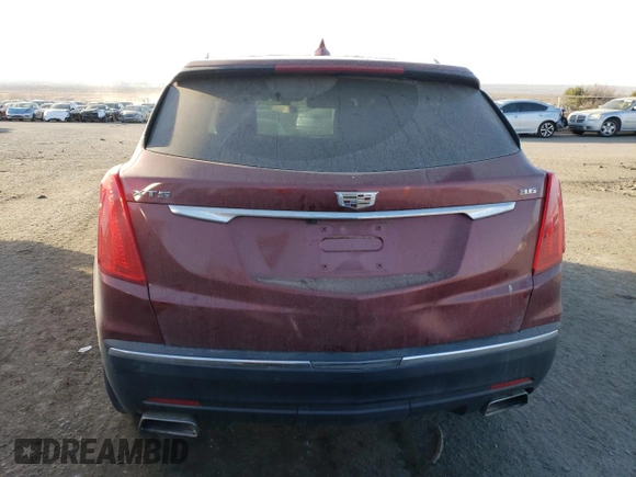 2018 Cadillac XT5 FWD with VIN 1GYKNARS2JZ241702, listed as a Copart auction lot 84031294 with 67,866 mi miles and Salvage title. Bid and sale history available at DreamBid. Image 6.