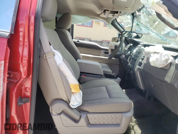 2010 Ford F-150 XL with VIN 1FTEW1C8XAFB04716, listed as a Copart auction lot 65761825 with 69,683 mi miles and Salvage title. Bid and sale history available at DreamBid. Image 7.