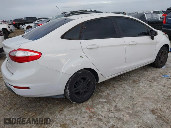 2017 Ford Fiesta SE with VIN 3FADP4BJXHM167605, listed as a IAAI auction lot 40510179 with 76,091 mi miles and . Bid and sale history available at DreamBid. Image 4.