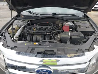 2011 Ford Fusion SE with VIN 3FAHP0HA1BR203046, listed as a IAAI auction lot 42011121 with 302,078 mi miles. Bid and sale history available at carsss.com. Image 10.