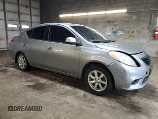 2014 Nissan Versa S Plus with VIN 3N1CN7AP6EL828134, listed as a Copart auction lot 53902045 with 142,825 mi miles and Salvage Title. Bid and sale history available at DreamBid. Image 4.