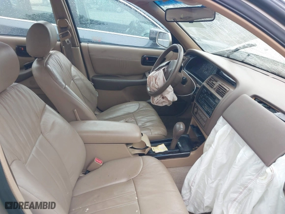 1997 Toyota Avalon XL with VIN 4T1BF12B1VU198756, listed as a IAAI auction lot 41613887 with 217,863 mi miles. Bid and sale history available at carsss.com. Image 5.