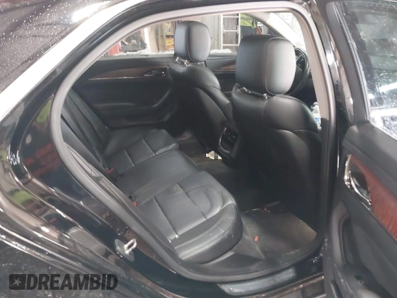 2016 Cadillac CTS Luxury Collection AWD with VIN 1G6AX5SX6G0111768, listed as a IAAI auction lot 41563991 with 76,718 mi miles and . Bid and sale history available at DreamBid. Image 8.