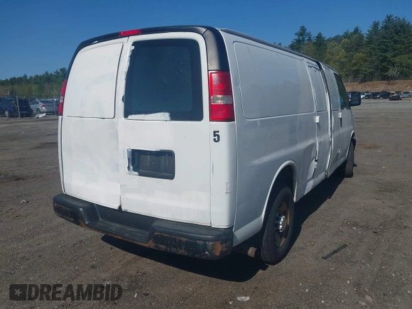 2014 Chevrolet Express Cargo with VIN 1GCWGGCA5E1125676, listed as a IAAI auction lot 42234161 with 285,045 mi miles and . Bid and sale history available at DreamBid. Image 4.