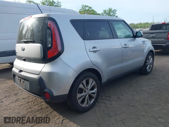 2015 Kia Soul + with VIN KNDJP3A56F7815122, listed as a IAAI auction lot 42119279 with 82,077 mi miles. Bid and sale history available at carsss.com. Image 4.