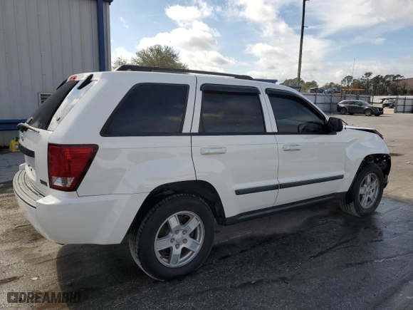 2007 Jeep Grand Cherokee Laredo with VIN 1J8HS48P37C626360, listed as a Copart auction lot 42608185 with 129,715 mi miles and Salvage Title. Bid and sale history available at carsss.com. Image 3.