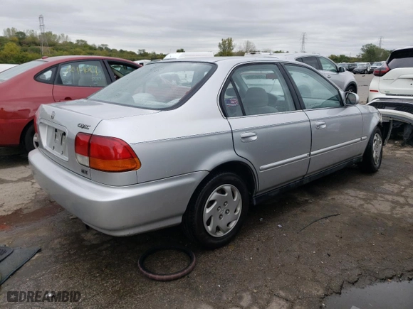 1997 Honda Civic EX with VIN 1HGEJ8647VL018949, listed as a Copart auction lot 72557904 with 162,531 mi miles and Salvage Title. Bid and sale history available at carsss.com. Image 3.