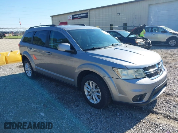 2017 Dodge Journey SXT z VIN 3C4PDCBG4HT563310, wystawiony jako IAAI lot #42190636 z przebiegiem 171 054 mil mil oraz . Historia ofert i sprzedaży dostępna na DreamBid. Obrazek 1.