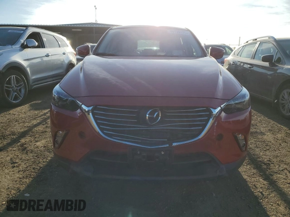 2018 Mazda CX-3 Grand Touring z VIN JM1DKFD79J0313779, wystawiony jako Copart lot #49120125 z przebiegiem 40 703 mil mil oraz Szkody całkowita. Historia ofert i sprzedaży dostępna na DreamBid. Obrazek 5.