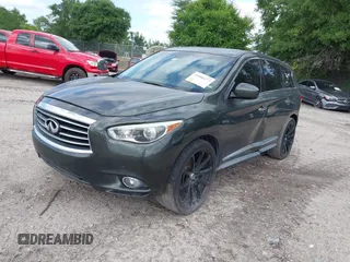 2013 Infiniti JX35 with VIN 5N1AL0MN8DC301195, listed as a IAAI auction lot 41886277 with 189,743 mi miles and . Bid and sale history available at DreamBid. Image 2.