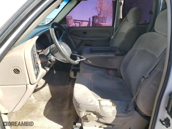 2002 Chevrolet Silverado 1500 LS with VIN 1GCEK19T22E244886, listed as a Copart auction lot 46494385 with 216,739 mi miles and Salvage Title. Bid and sale history available at carsss.com. Image 7.