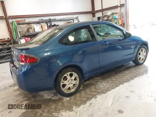 2009 Ford Focus SE with VIN 1FAHP32N09W244420, listed as a IAAI auction lot 41952030 with 165,886 mi miles. Bid and sale history available at carsss.com. Image 4.