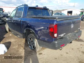 2022 Honda Ridgeline RTL-E z VIN 5FPYK3F7XNB029931, wystawiony jako IAAI lot #41213133 z przebiegiem Nie podano mil oraz . Historia ofert i sprzedaży dostępna na DreamBid. Obrazek 3.
