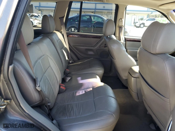 2004 Jeep Grand Cherokee Limited with VIN 1J4GW58SX4C246505, listed as a Copart auction lot 41424125 with 198,246 mi miles and Salvage Title. Bid and sale history available at carsss.com. Image 10.