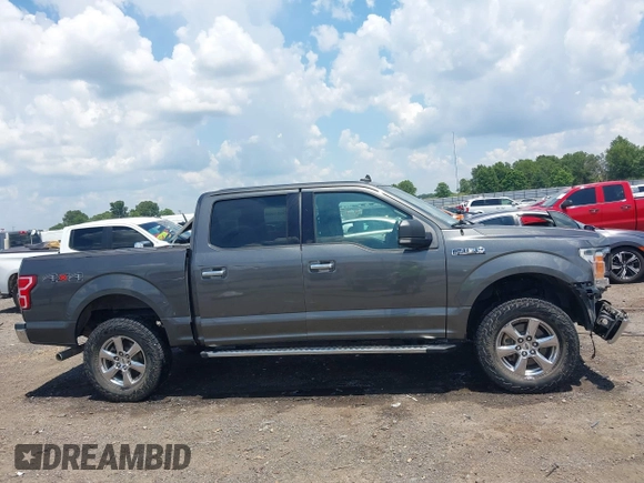 2019 Ford F-150 XL with VIN 1FTEW1E52KKE98899, listed as a IAAI auction lot 42576904 with 168,223 mi miles and . Bid and sale history available at DreamBid. Image 14.