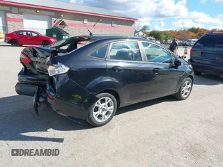 2015 Ford Fiesta SE with VIN 3FADP4BJXFM189438, listed as a IAAI auction lot 40535245 with 102,013 mi miles. Bid and sale history available at carsss.com. Image 4.