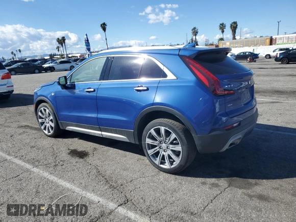 2023 Cadillac XT4 AWD Premium Luxury z VIN 1GYFZDR44PF206176, wystawiony jako Copart lot #46456445 z przebiegiem 3 896 mil mil oraz Szkoda całkowita • Salvage title. Historia ofert i sprzedaży dostępna na DreamBid. Obrazek 2.