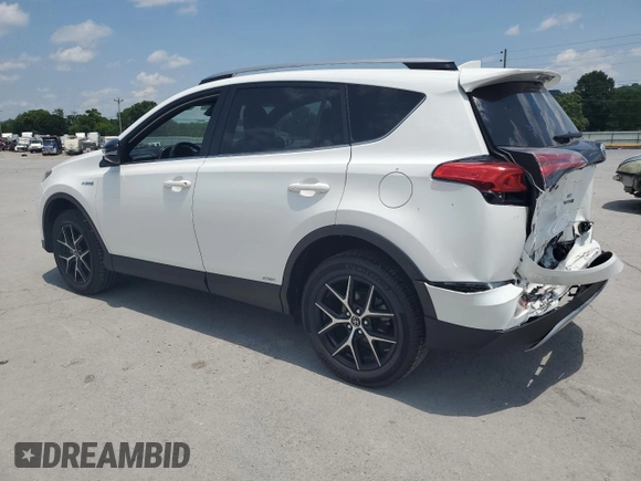 2018 Toyota RAV4 Hybrid SE with VIN JTMJJREVXJD212926, listed as a Copart auction lot 60215465 with 71,876 mi miles and Salvage title. Bid and sale history available at DreamBid. Image 2.