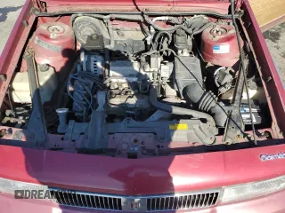 1993 Oldsmobile Cutlass z VIN 1G3AJ85N8P6362475, wystawiony jako Copart lot #45789795 z przebiegiem 103 756 mil mil oraz Tytuł czysty. Historia ofert i sprzedaży dostępna na DreamBid. Obrazek 11.