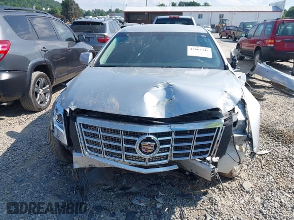 2013 Cadillac XTS Luxury z VIN 2G61R5S38D9228339, wystawiony jako IAAI lot #42664948 z przebiegiem 105 917 mil mil oraz . Historia ofert i sprzedaży dostępna na DreamBid. Obrazek 13.