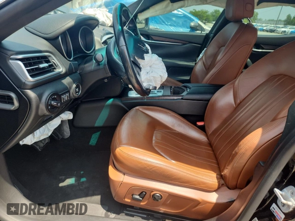 2014 Maserati Ghibli S Q4 with VIN ZAM57RTA5E1122165, listed as a Copart auction lot 60257835 with Not provided miles and Salvage title. Bid and sale history available at DreamBid. Image 7.