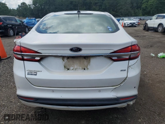 2017 Ford Fusion SE с VIN 3FA6P0H75HR392711, выставлен на аукционе Copart как лот 61758105 с пробегом 166 348 миль миль и Чистый • Clean title. История ставок и продаж доступна на DreamBid. Изображение 6.