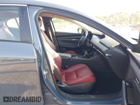 2024 Mazda 3 S Carbon Edition with VIN 3MZBPBCM6RM411828, listed as a IAAI auction lot 42802141 with 40,061 mi miles and . Bid and sale history available at DreamBid. Image 5.