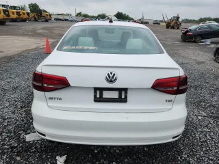 2015 Volkswagen Jetta SE z VIN 3VWD17AJ7FM220222, wystawiony jako Copart lot #62866345 z przebiegiem 68 273 mil mil oraz Szkoda całkowita • Salvage title. Historia ofert i sprzedaży dostępna na DreamBid. Obrazek 6.