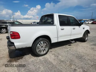 2001 Ford F-150 XLT with VIN 1FTRW07W71KE61878, listed as a Copart auction lot 60516665 with Not provided miles and Salvage title. Bid and sale history available at DreamBid. Image 3.