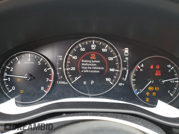 2021 Mazda 3 Preferred with VIN JM1BPBLL1M1340795, listed as a Copart auction lot 52627905 with 13,596 mi miles and Salvage title. Bid and sale history available at DreamBid. Image 9.