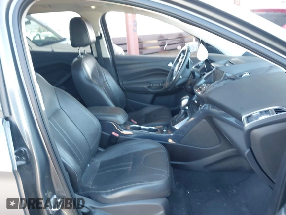 2013 Ford Escape Titanium with VIN 1FMCU0J95DUA29390, listed as a IAAI auction lot 42720269 with 147,413 mi miles and . Bid and sale history available at DreamBid. Image 5.
