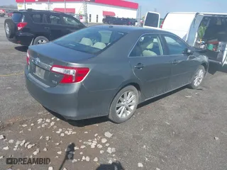 2014 Toyota Camry Hybrid LE with VIN 4T1BD1FK6EU129691, listed as a IAAI auction lot 41796112 with 264,392 mi miles. Bid and sale history available at carsss.com. Image 4.