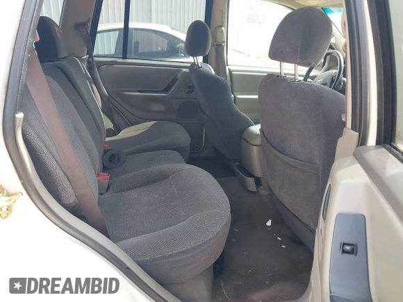 2003 Jeep Grand Cherokee Laredo z VIN 1J4GX48S33C519404, wystawiony jako IAAI lot #42164364 z przebiegiem 174 627 mil mil oraz . Historia ofert i sprzedaży dostępna na DreamBid. Obrazek 8.