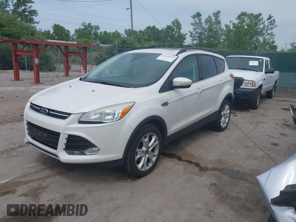 2013 Ford Escape SEL with VIN 1FMCU9H90DUC52981, listed as a IAAI auction lot 42506500 with 74,212 mi miles and . Bid and sale history available at DreamBid. Image 2.